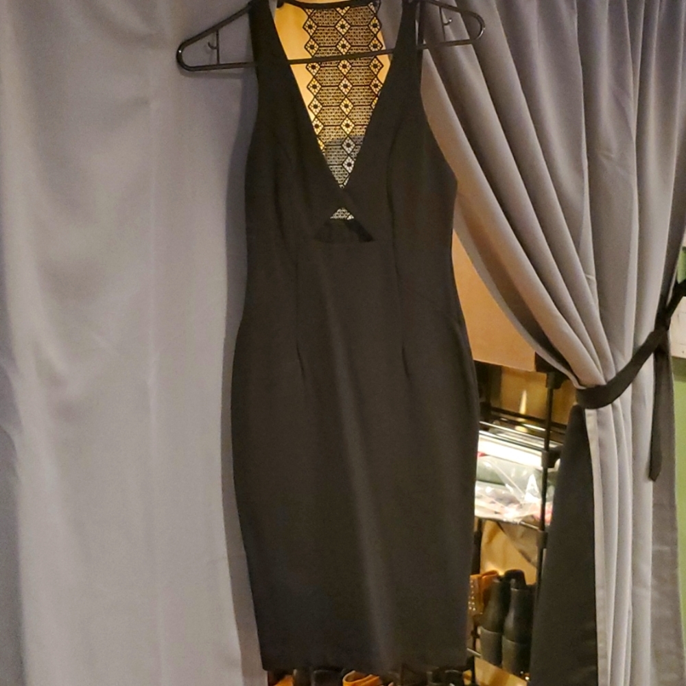 Sexy Black Dress, detail back. Fitted.